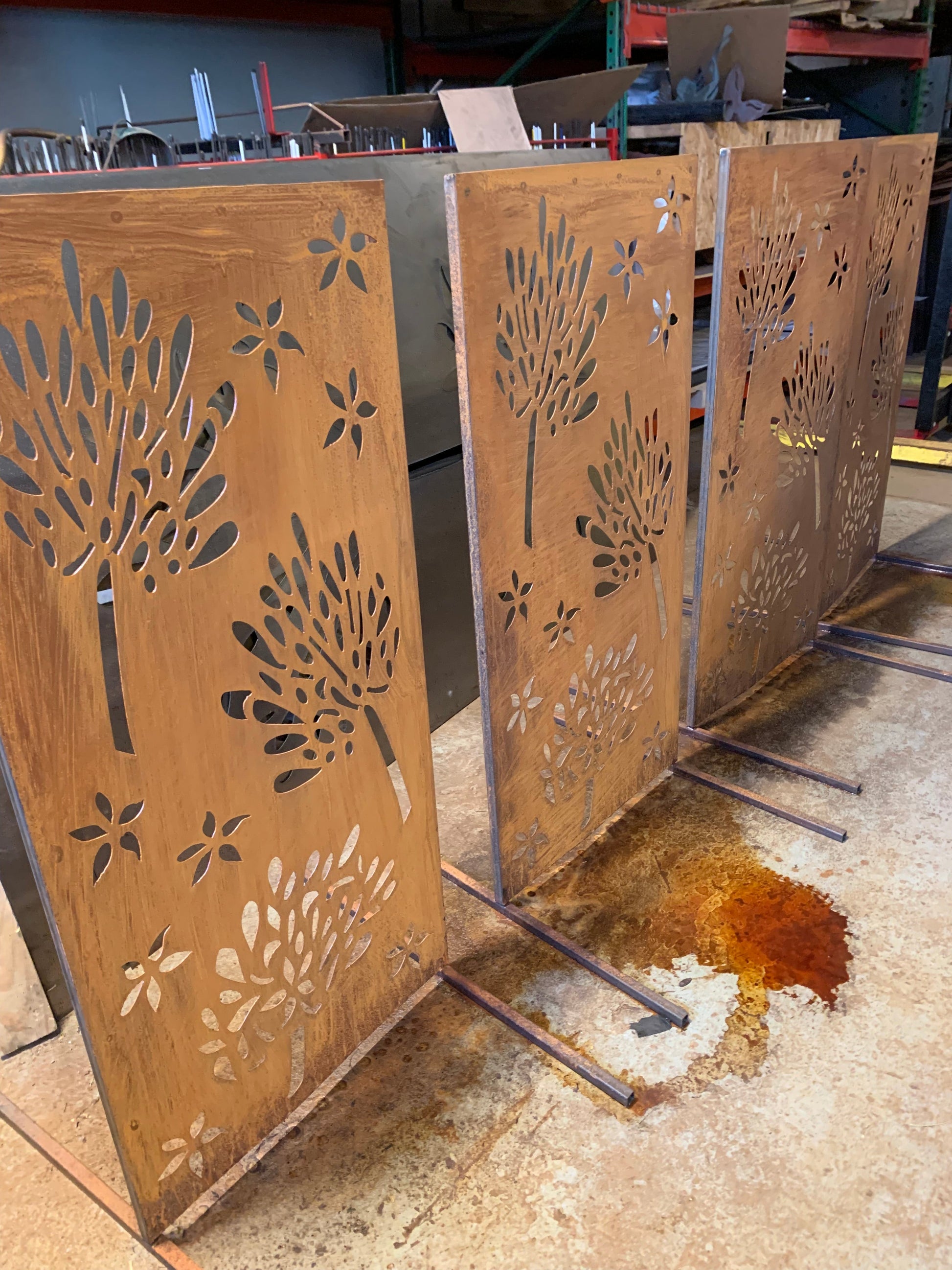 Rusted metal privacy screens with floral cutouts Rustica Ornamentals 46-inch panels on Tampa on Tampa Home & Garden Store