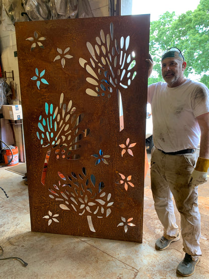 Outdoor metal privacy screen panel in rust finish with floral cutouts by Rustica Ornamentals on Tampa Home & Garden Store