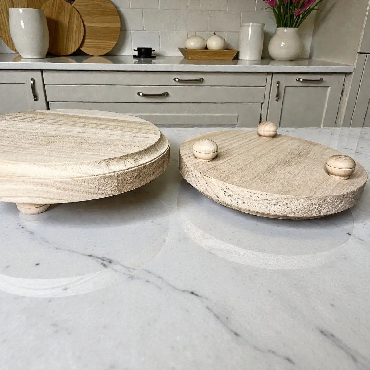 Two rustic round wood jewelry trays with natural finish; one tray features three knobs on Tampa Home & Garden Store