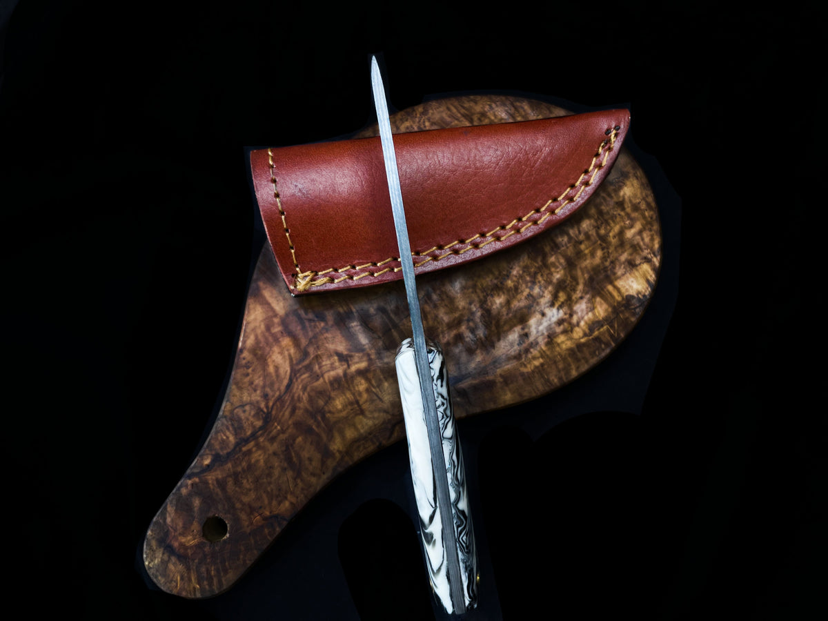 Arrival TD-705 hunting knife by Titan International K with marbled handle and brown leather sheath on Tampa Home & Garden Store