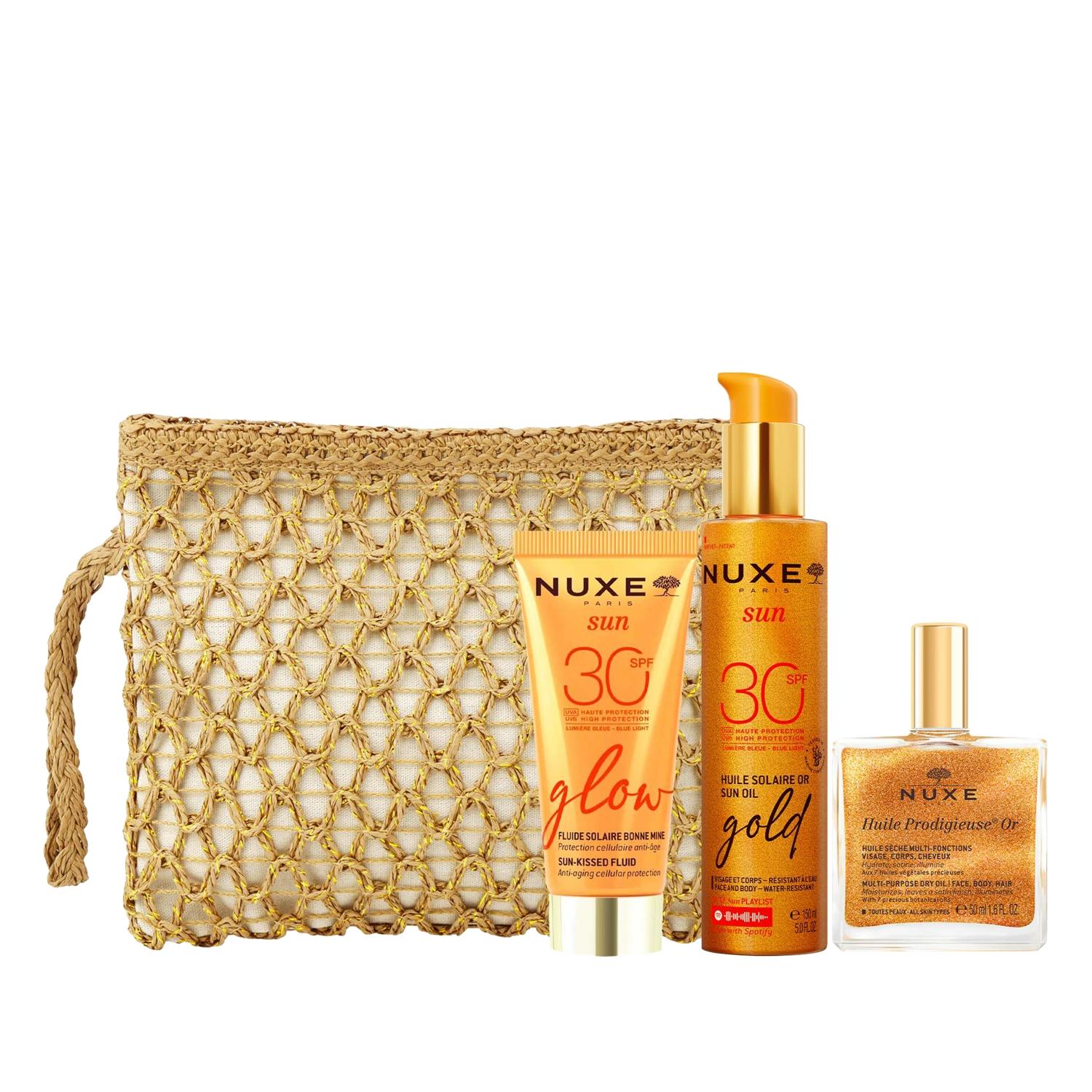 Nuxe Sun Golden Summer Routine Set with SPF 30 tubes and gold oil beside a woven pouch on Tampa Home & Garden Store