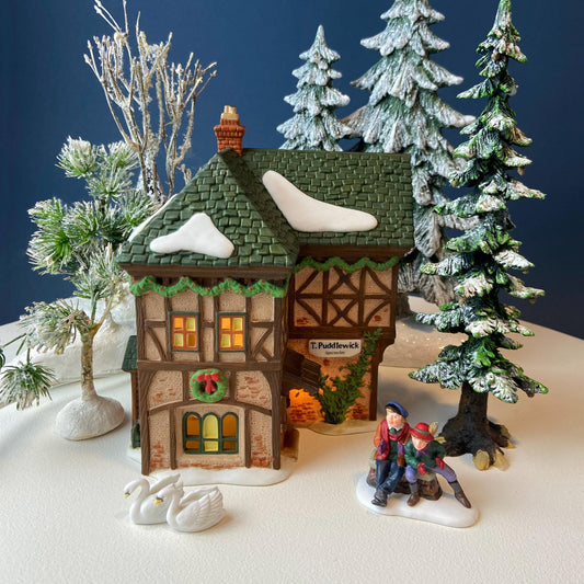 Illuminated Christmas Village T. Puddlewick Spectacle Shop by Dept. 56. Dickens' Village. Seasonal Home Retail Decor. Night Light. - Tampa Home & Garden Store