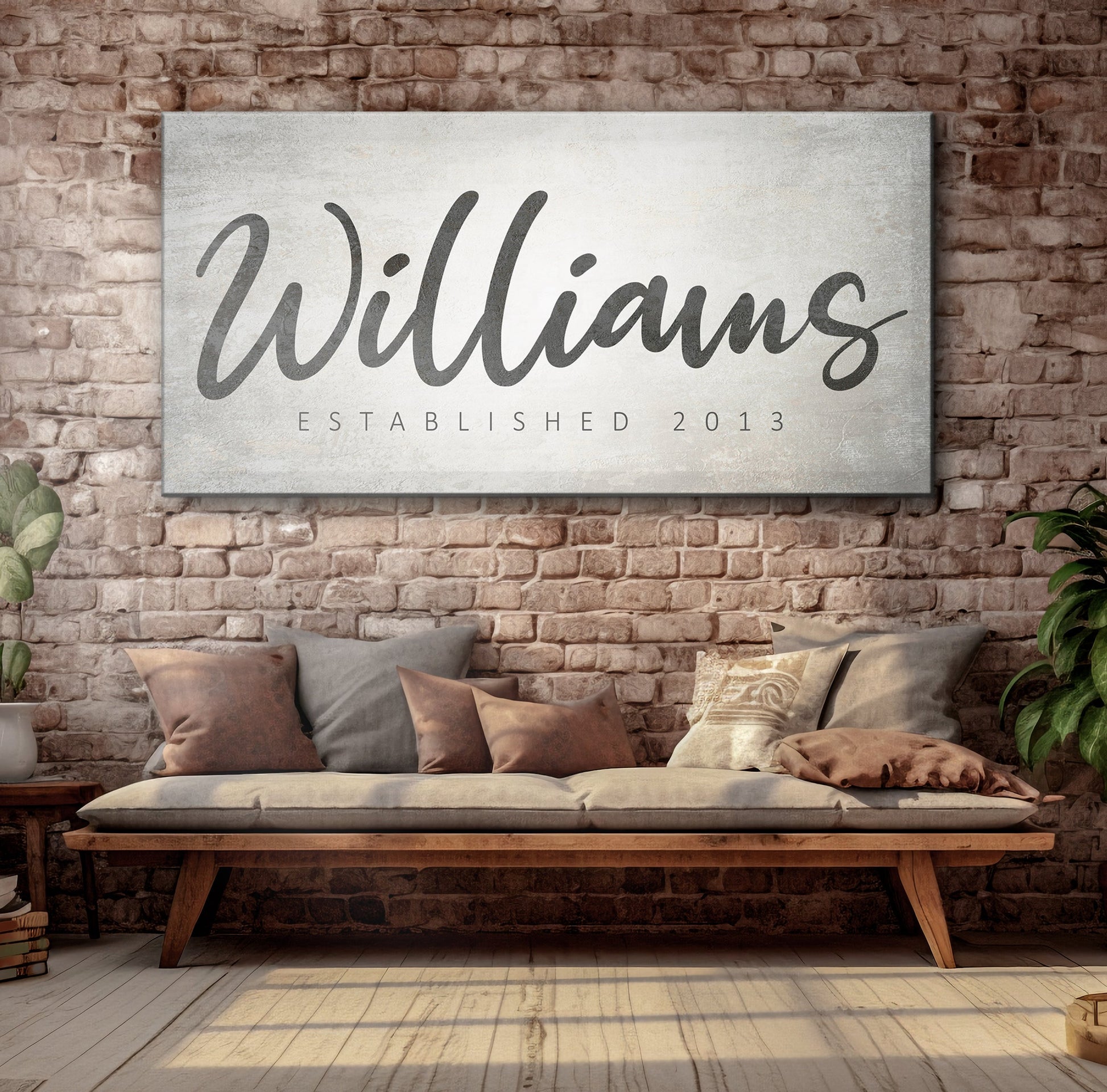 Family Name Sign IV canvas with a black cursive surname on a textured backdrop brick wall on Tampa Home & Garden Store