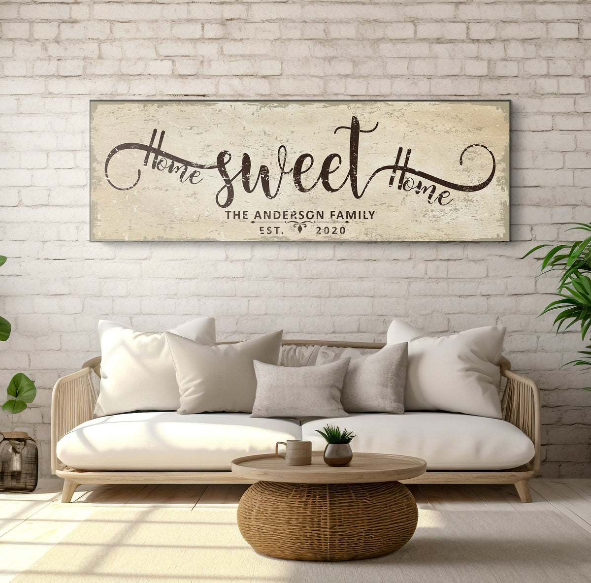 Home Sweet Home canvas sign with rustic beige distress and flowing script above sofa on Tampa Home & Garden Store