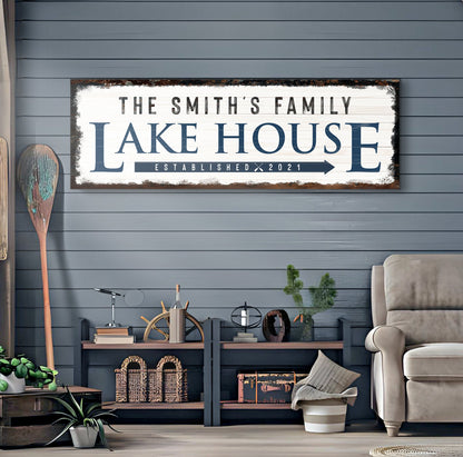 Canvas sign Family Lake House Arrow Sign by Tailored Canvases, rustic white with blue lettering on Tampa Home & Garden Store
