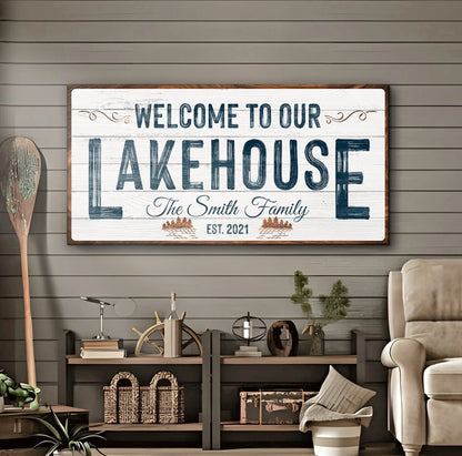 Welcome To Our Lakehouse Sign canvas with distressed white planks and bold blue lettering on Tampa Home & Garden Store