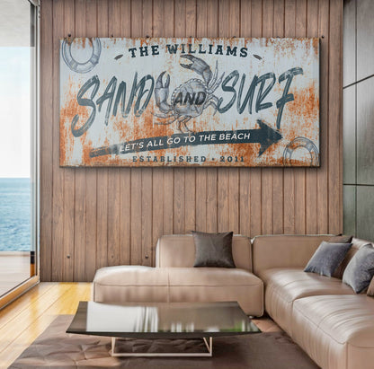 Canvas sign Sand And Surf V by Tailored Canvases, rust patina with crab and blue lettering on Tampa Home & Garden Store