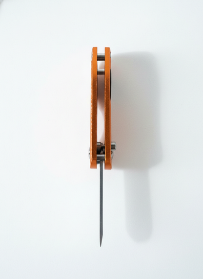 Limited Edition Divot Tool orange anodized aluminum frame with steel spike on Tampa Home & Garden Store