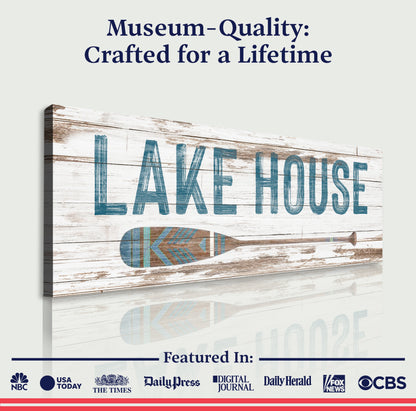 Lake House Coastal Sign II canvas with weathered white planks and blue lettering with paddle on Tampa Home & Garden Store