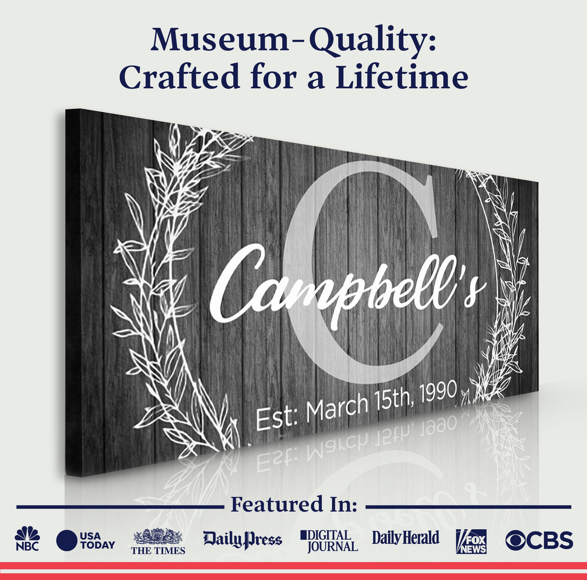 Family Name Sign canvas by Tailored Canvases with dark wood grain backdrop and white script monogram on Tampa Home & Garden Store