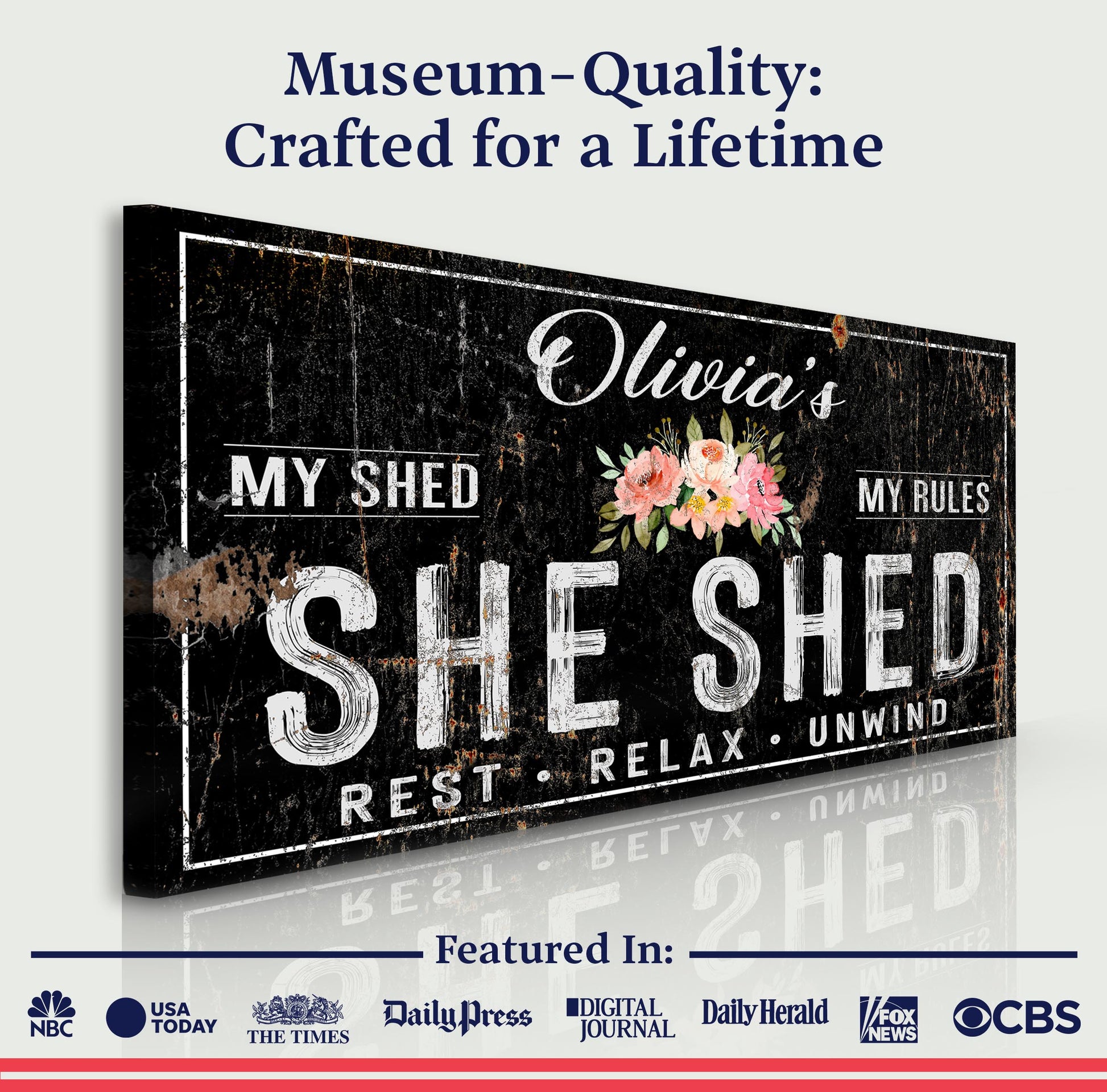Canvas sign IX: Personalized She Shed on a black distressed board with floral bouquet on Tampa Home & Garden Store
