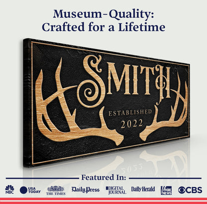 Personalized Family Antler Sign canvas with gold-foil lettering on black textured surface on Tampa Home & Garden Store