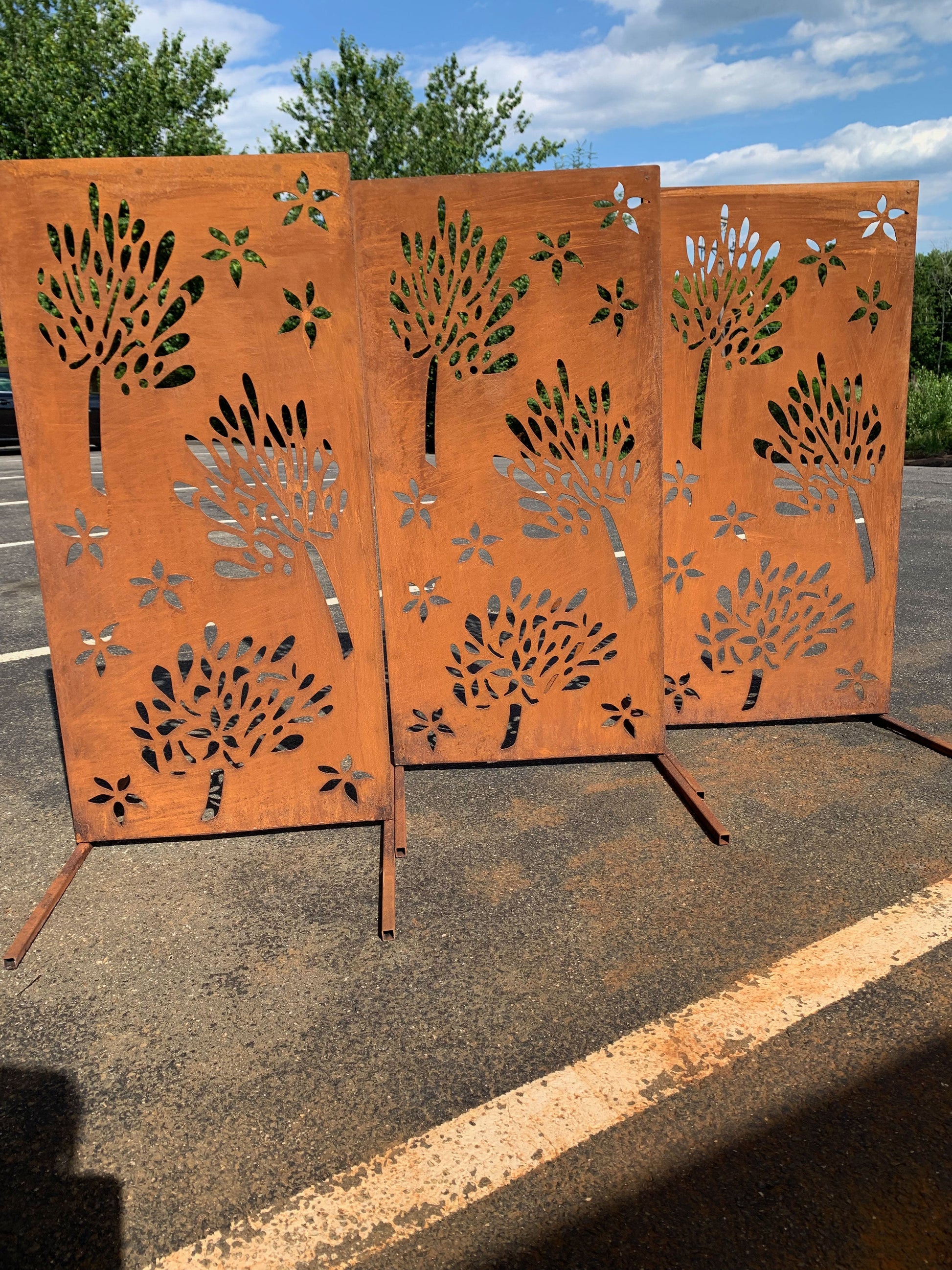 Three-panel outdoor privacy screens, rust-colored metal wall art with tree-cutout panels, 46in on Tampa Home & Garden Store