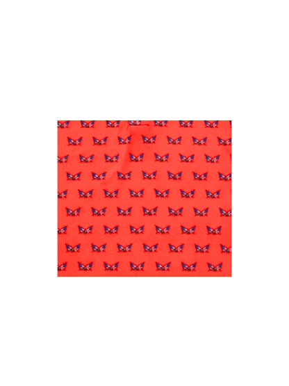 Independence Performance Polo fabric in red-orange with butterfly motif on Tampa Home & Garden Store