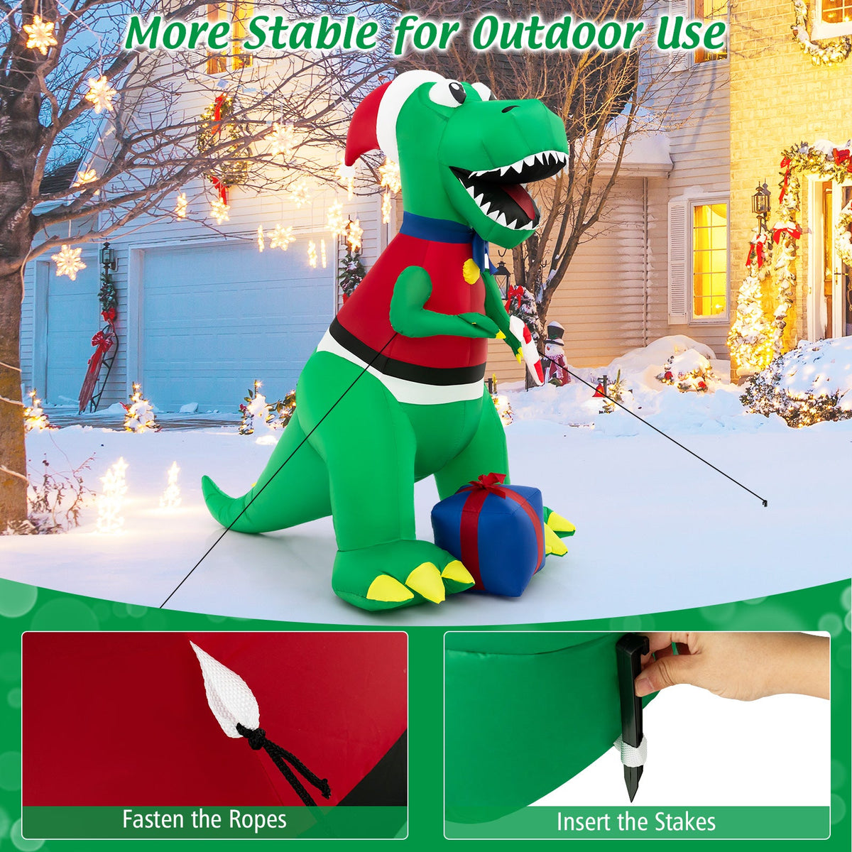 Green inflatable Christmas dinosaur with Santa hat, LED lights, and stakes in snow on Tampa Home & Garden Store