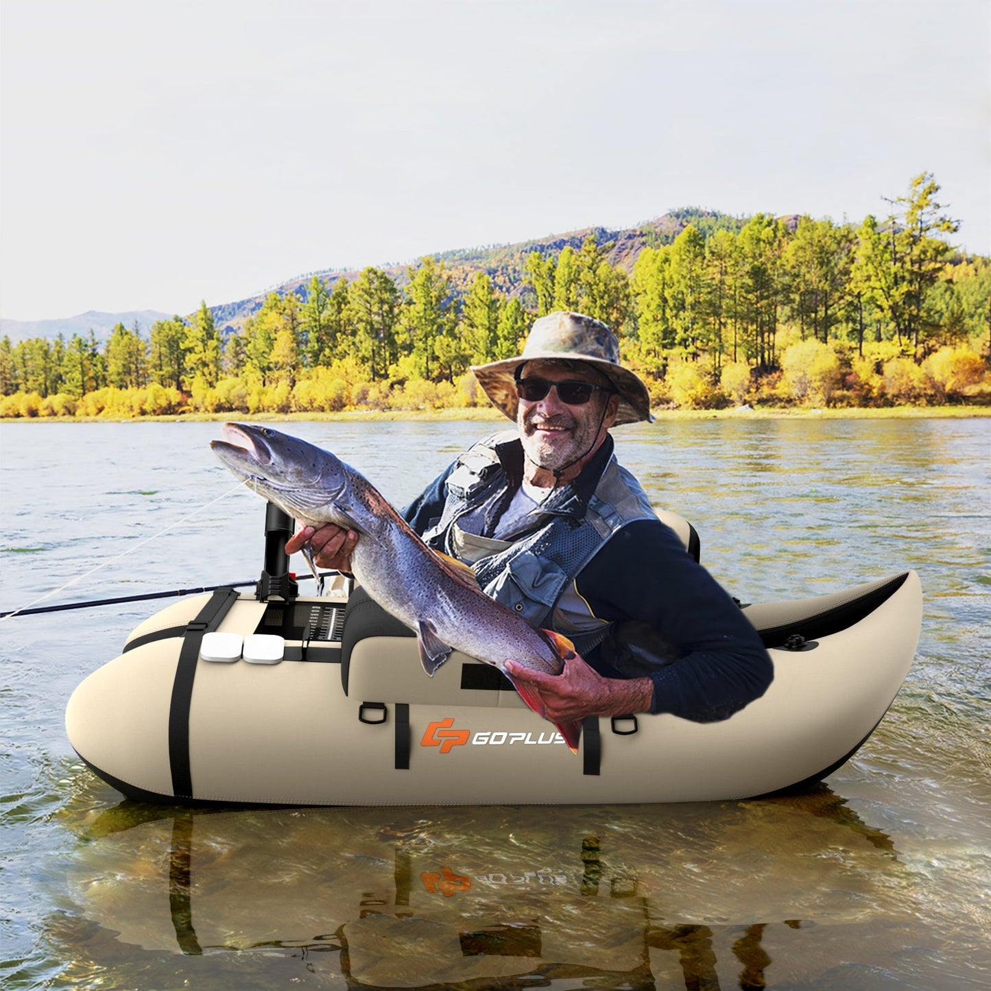 GoPlus inflatable fishing raft with a man holding a large fish on a riverbank on Tampa Home & Garden Store