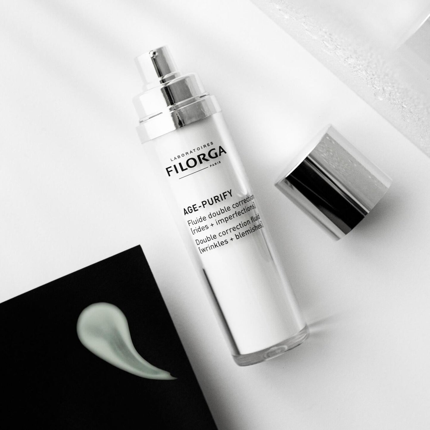 Filorga Age-Purify facial fluid bottle with silver pump, white container on Tampa Home & Garden Store