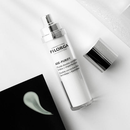 Filorga Age-Purify facial fluid bottle with silver pump, white container on Tampa Home & Garden Store