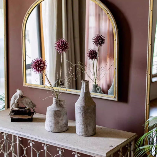 Rustic Thistle Pod Stem burgundy spiky blooms in gray concrete vases on a vintage console on Tampa Home & Garden Store