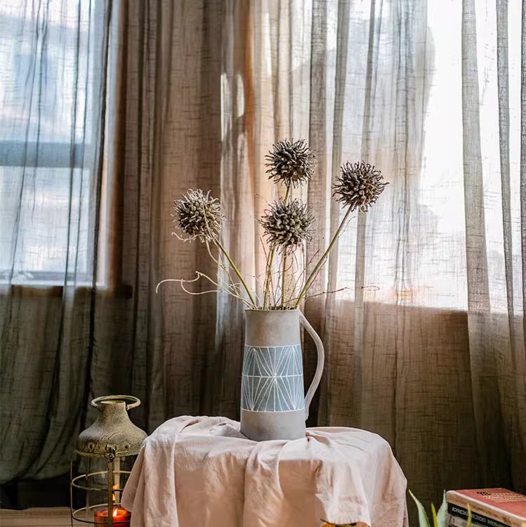 Rustic Thistle Pod Stem 27.5" Tall artificial flowering plant with five seed heads in a blue vase on Tampa Home & Garden Store