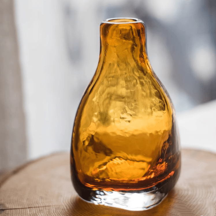 Amber handblown glass bottle vase by RusticReach, rounded form with a clear base on Tampa Home & Garden Store