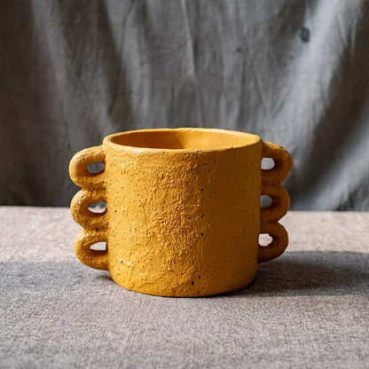 Artisan Loop Handle Cement Planter in mustard yellow with textured surface and side loop handles on Tampa Home & Garden Store