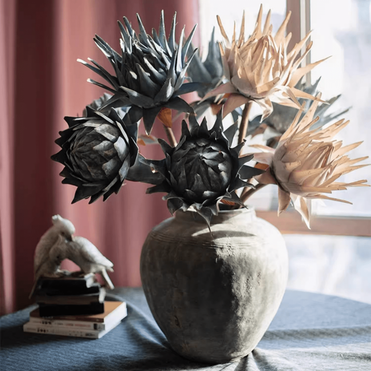 Artificial artichoke stems in gray and beige, 37 inches tall, arranged in a rustic ceramic vase on Tampa Home & Garden Store