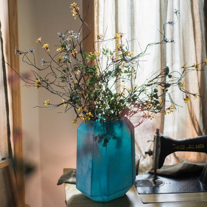 Faux silk baby's-breath vine stem, 27 inches tall in a teal geometric vase by RusticReach on Tampa Home & Garden Store