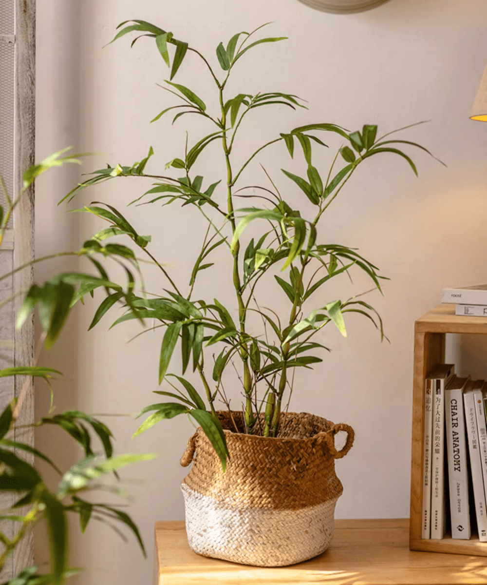 Artificial Bamboo Leaves in Pot by RusticReach with green foliage in a two-tone woven basket on Tampa Home & Garden Store