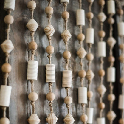 Wood beaded door curtain with natural beige beads on jute twine on Tampa Home & Garden Store