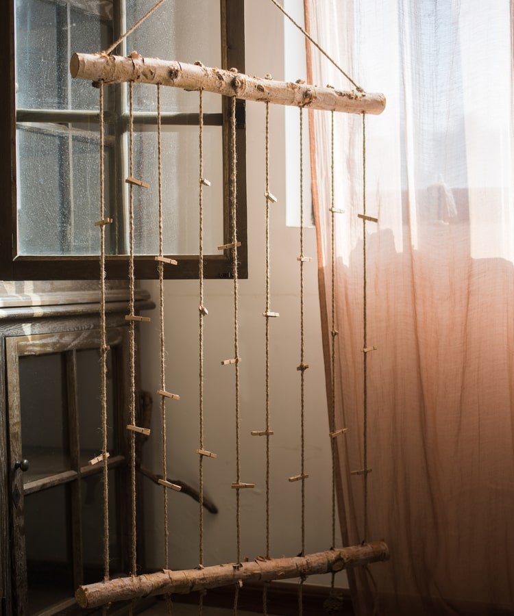 Birch Wood Photo Wall Hanger by RusticReach with twine cords and mini wooden clothespins on Tampa Home & Garden Store
