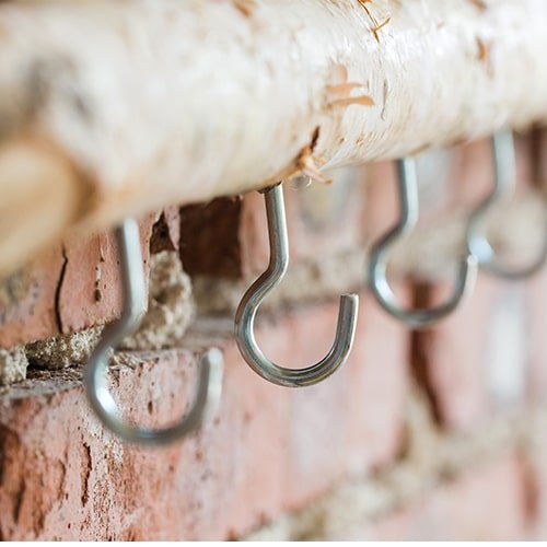 Birch Wood Craft Wall Hanger by RusticReach with metal S-hooks on rustic brick wall on Tampa Home & Garden Store
