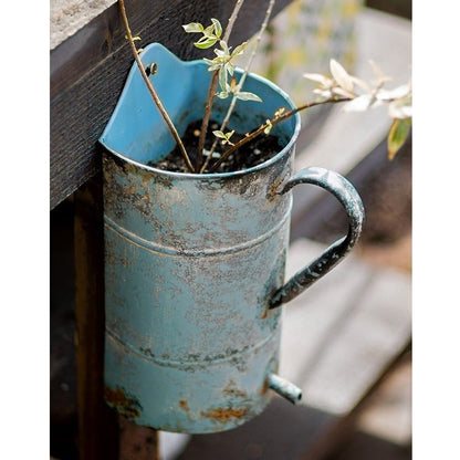 Rustic blue iron flower pot with handle, weathered metal planter on Tampa Home & Garden Store