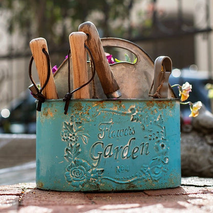 Blue metal basket tool organizer with wooden-handled garden tools RusticReach on Tampa Home & Garden Store