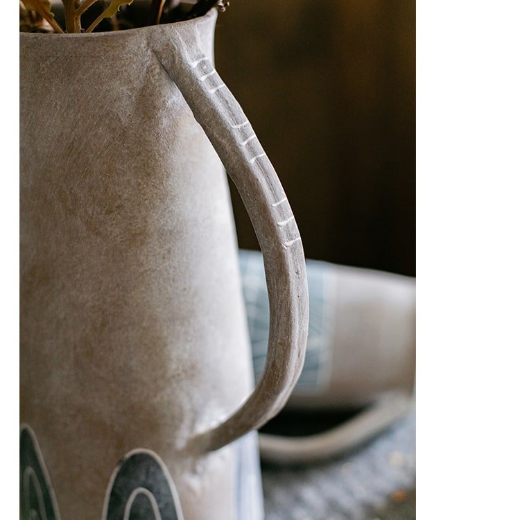 Blue handpainted terracotta vase jar by RusticReach, close-up of textured curved handle on Tampa Home & Garden Store