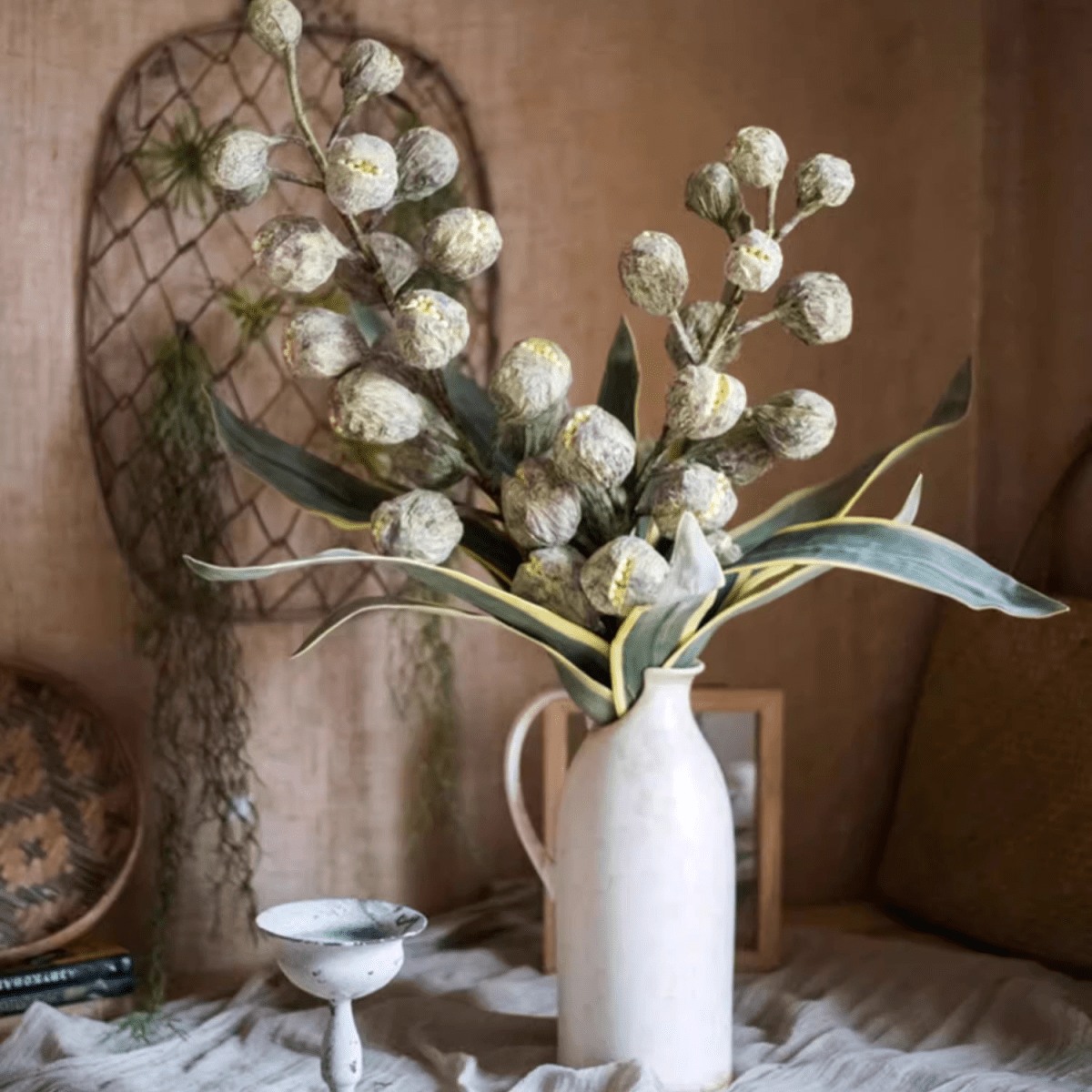 Designer Fruit Bouquet in ceramic pitcher with frosted berry clusters and green leaves on Tampa Home & Garden Store