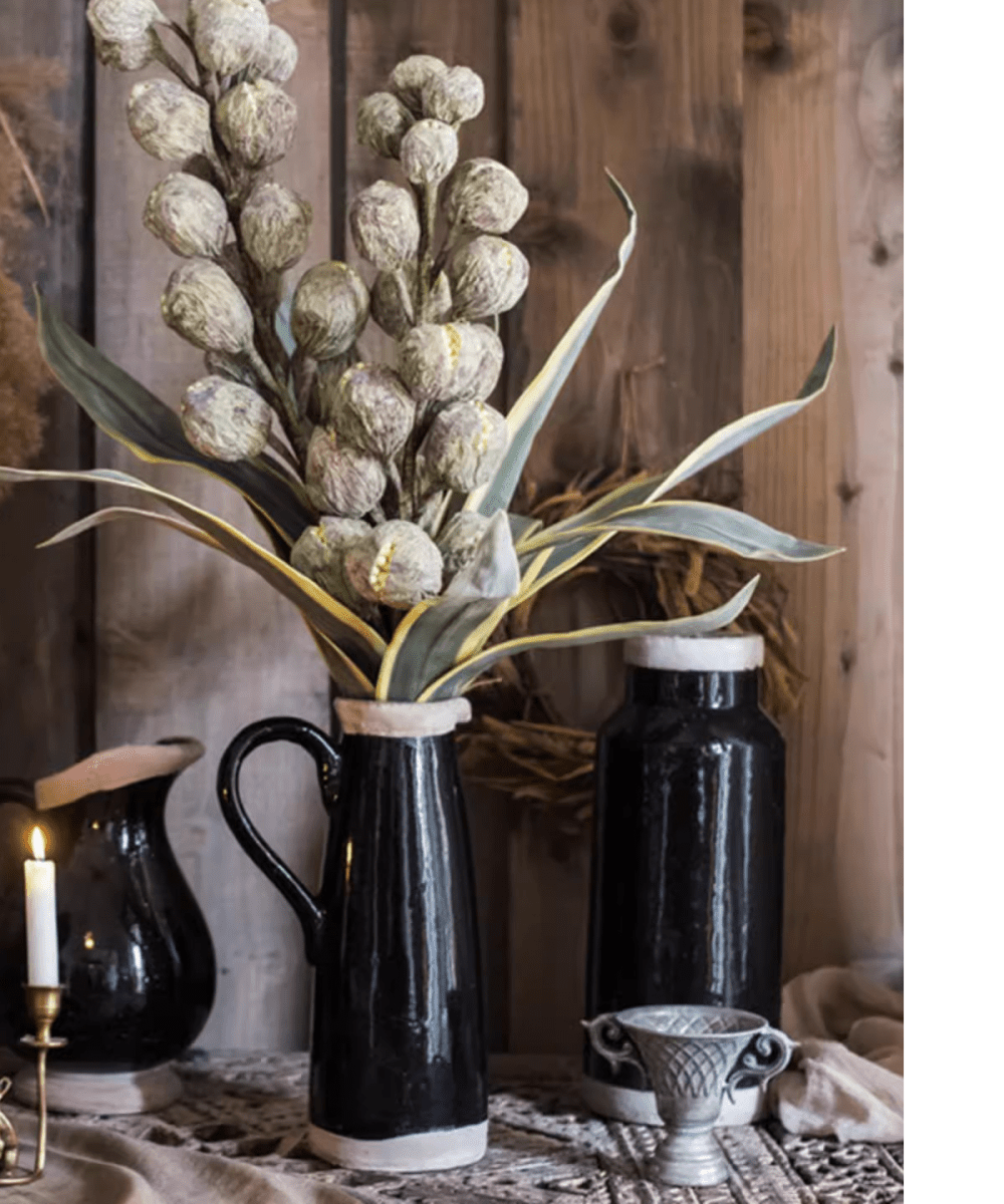 Designer Fruit Bouquet by RusticReach in black ceramic pitcher with pale berries and leaves on Tampa Home & Garden Store