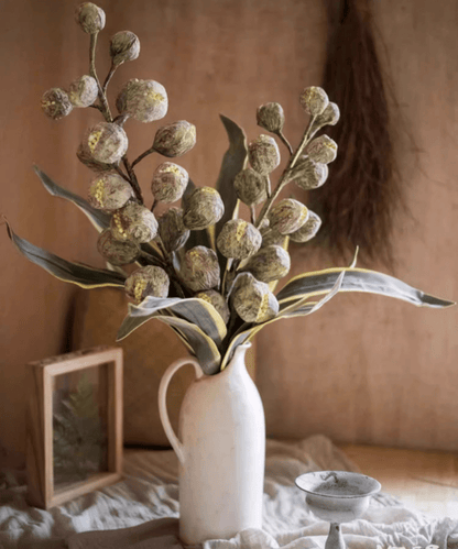 Designer Fruit Bouquet RusticReach in a white pitcher with dried pods and green leaves on Tampa Home & Garden Store