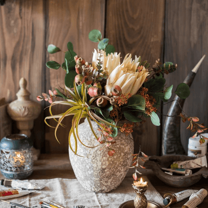 Mountian Oriole Autumn Art King Protea Bouquet in a stone vase with eucalyptus RusticReach on Tampa Home & Garden Store