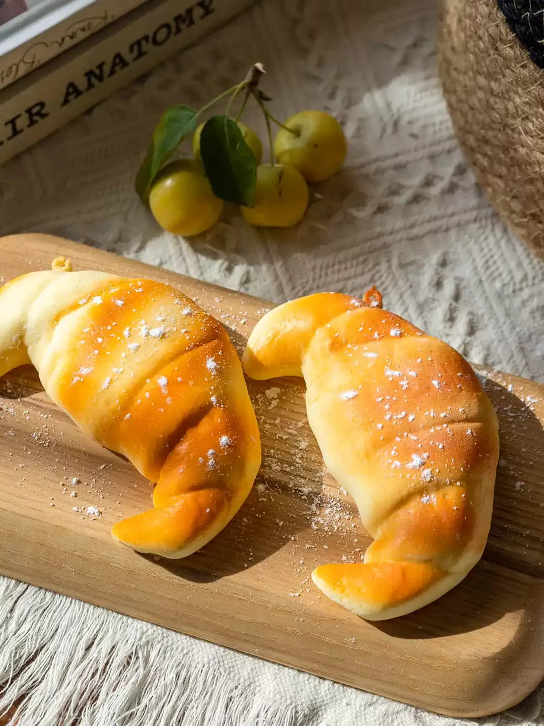 Artificial Bread & Pastry Display Props RusticReach; two golden croissant buns on a wooden board on Tampa Home & Garden Store