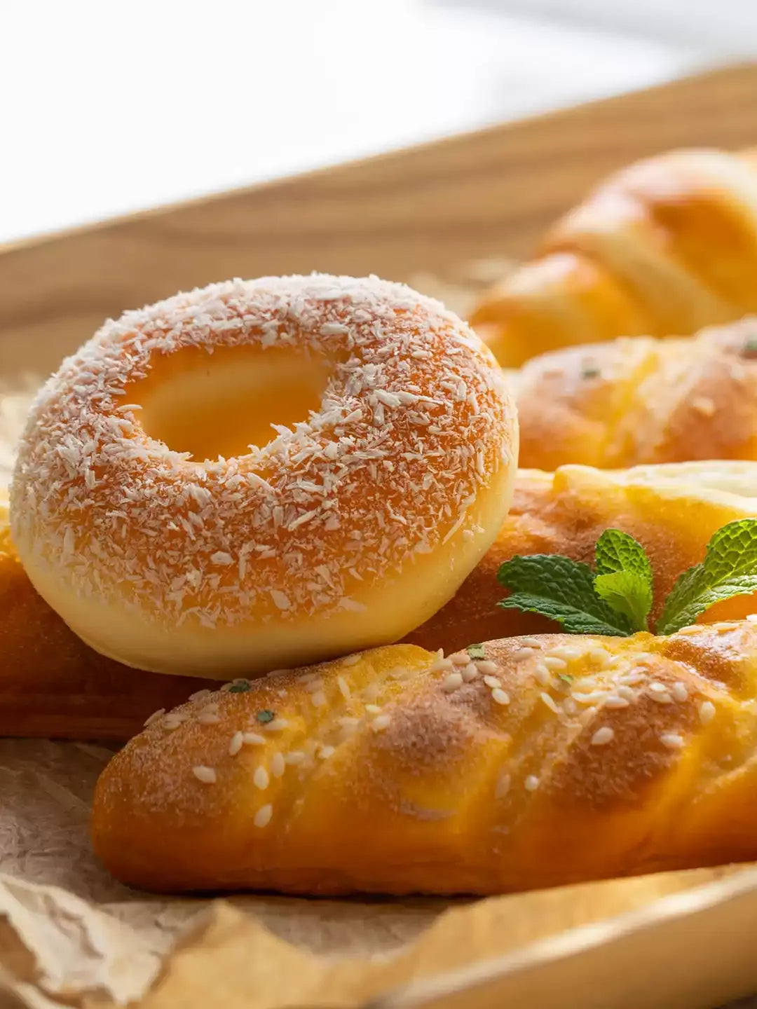 Artificial Bread & Pastry Display Prop by RusticReach, coconut-dusted ring doughnut in tan on Tampa Home & Garden Store