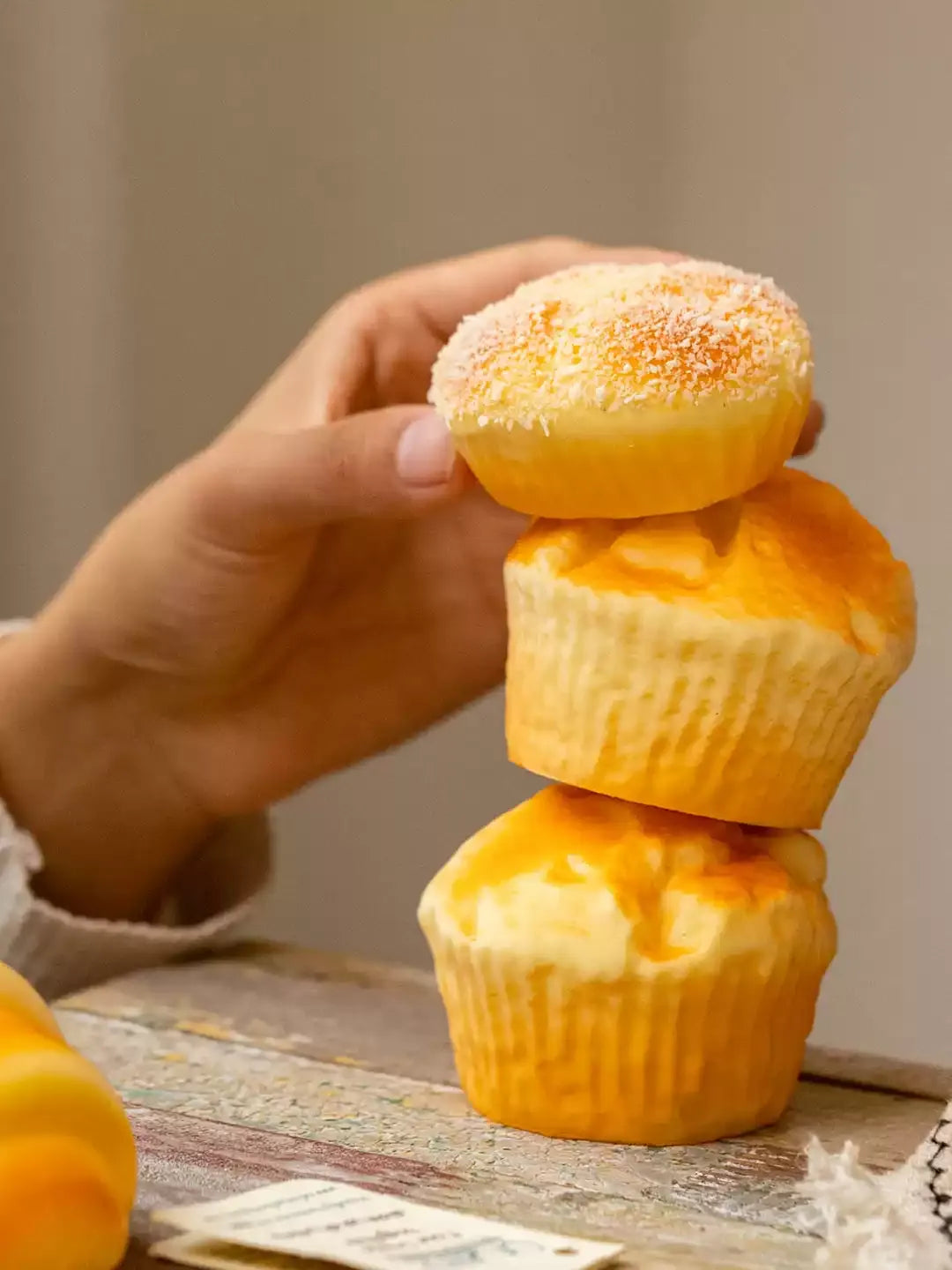 Artificial Bread & Pastry Display Props RusticReach stacked yellow muffins with coconut topping on Tampa Home & Garden Store