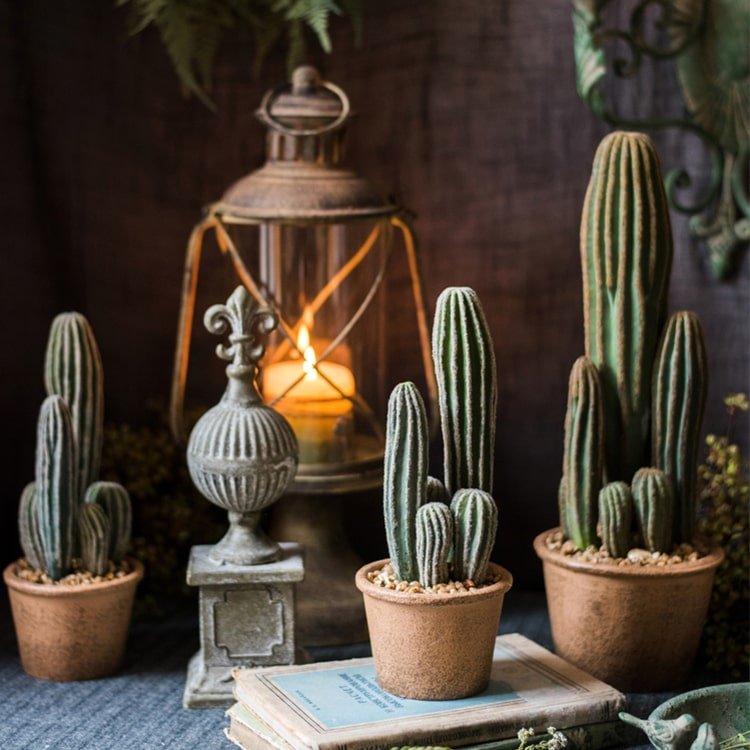 Artificial cactus trio in brown pots, green ribbed stems in small clay planters on display on Tampa Home & Garden Store