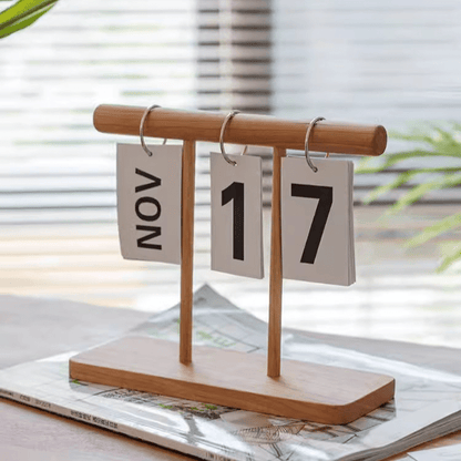 Page-flipping wooden desktop calendar by RusticReach with three cards showing Nov 17 on Tampa Home & Garden Store