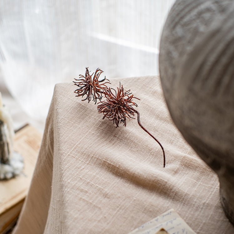 Plastic Cangli Stem 33in tall brown spiky seed pods on beige linen RusticReach on Tampa Home & Garden Store