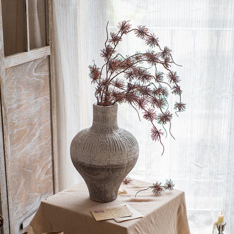 Ceramic vase by RusticReach in gray with textured pattern and tall neck holding dried branches on Tampa Home & Garden Store