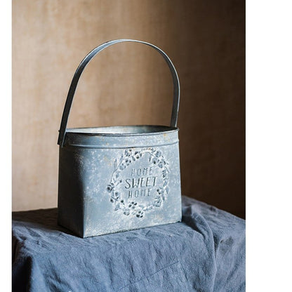 Iron Carry Flower Pot gray with embossed wreath and Home Sweet Home text, metal handle on Tampa Home & Garden Store