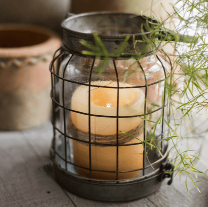 European Restoration Candle Holder by RusticReach, bronze cage over glass jar with candle on Tampa Home & Garden Store