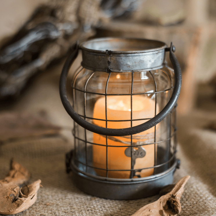 European Restoration Candle Holder RusticReach: metal wire lantern with glass candle inside on Tampa Home & Garden Store