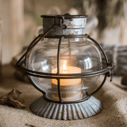 European Restoration Candle Holder by RusticReach with glass globe and metal cage on Tampa Home & Garden Store